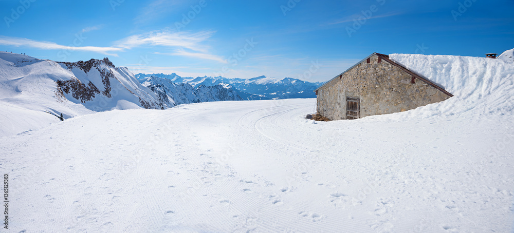 winter landscape at Nebelhorn mountain Oberstdorf, snowbound alpine hut.
