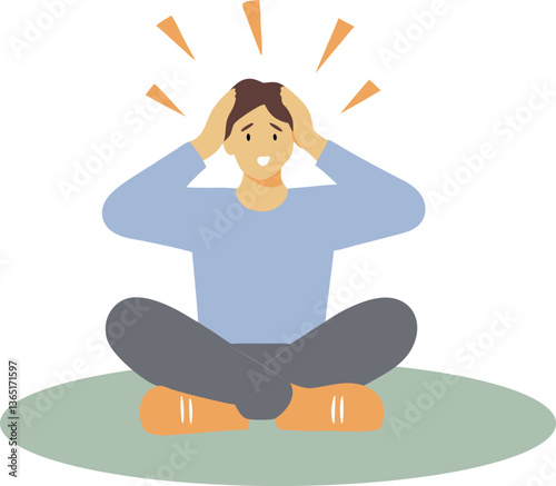 A man is sitting on the floor with his head down