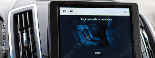 Panorama view Check rear seat for occupant reminder on middle 12-inch LCD touchscreen modern SUV car, system alert driver check rear seats before exiting, prevent leaving children, pet unattended