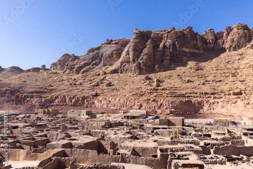 Elevated view over AlUla valley with old town and modern road, Saudi Arabia