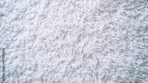 Soft, fluffy white rug texture, perfect for cozy interiors and adding warmth to any space. Ideal for home decor and comfort