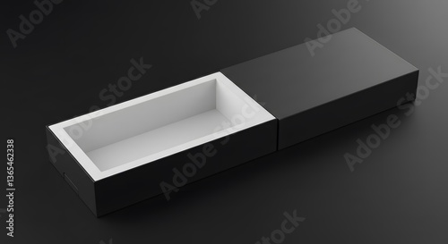 A sleek black and white box with a sliding lid partially open on a dark gray background surface