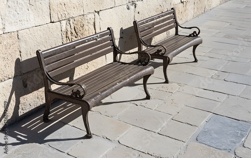 Wallpaper Mural Two Vintage Metal Benches by Stone Wall Outdoors Torontodigital.ca