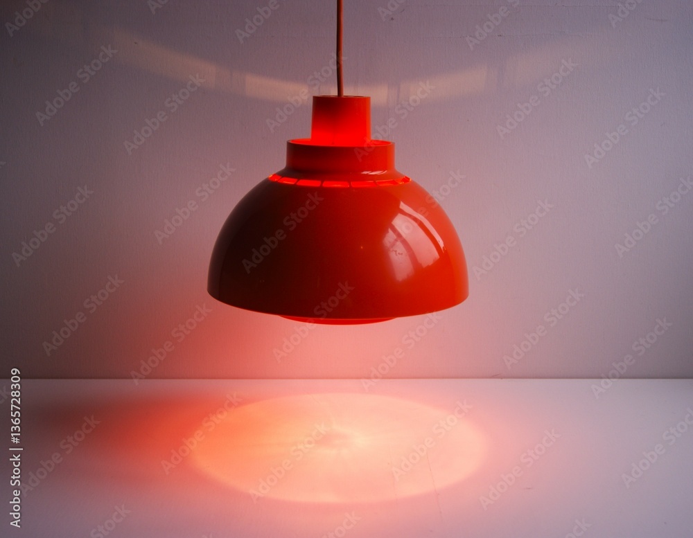 Obraz premium Orange ceiling lamp in plastic. Denmark 1970s.