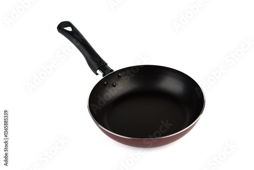 New kitchen frying pan with non-stick coating and black handle on white background.