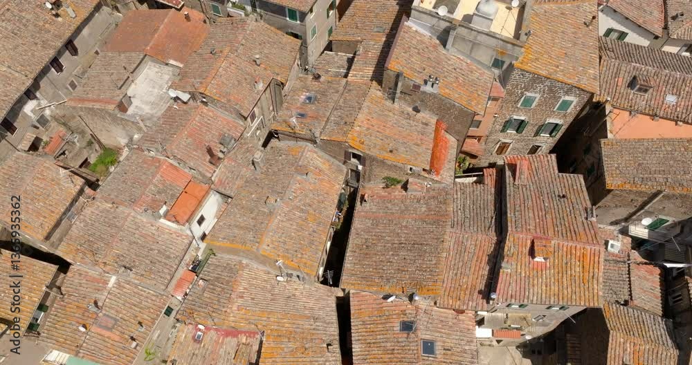Aerial view of the red roofs of an Italian town. Historic center in Italy. Aerial view of the red roofs of an Italian town. Historic center in Italy.