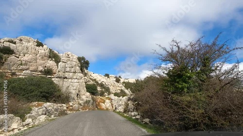 Road to Antequerra National Park, limestone rock formations and known for unusual karst landforms in Andalusia, Malaga, Spain.