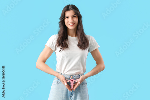 Young woman with paper uter...