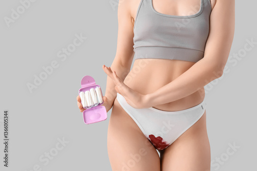 Menstruating woman in stain...