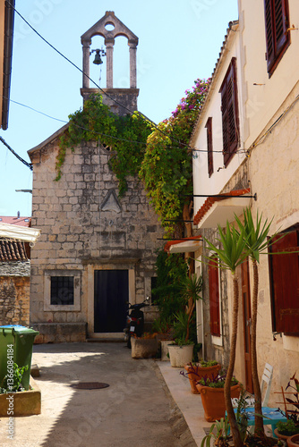 Obraz na płótnie Picturesque Mediterranean street and traditional architectural details in Trogir, Croatia. w salonie