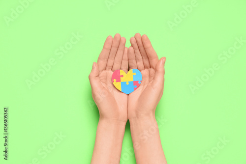 Female hands holding colorf...