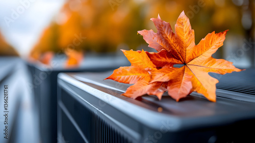 Home HVAC maintenance. Fall cleaning, repair, service. Autumn leaves covering air conditioning units