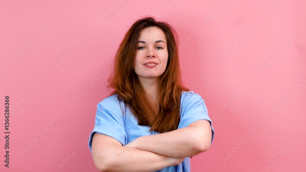 Portrait of a friendly Caucasian young woman smiling against an isolated background Portrait of a friendly Caucasian young woman smiling against an isolated background