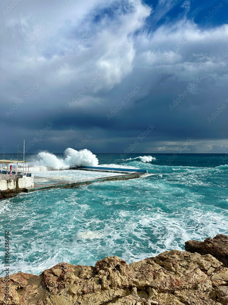 Storm in the Mediterranean Sea and waves crashing on the beach in Sliema, Malta