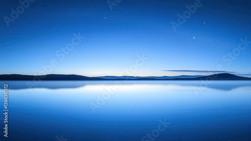 Tranquil Blue Lake Reflecting the Night Sky at Dusk with Stars in a Peaceful Landscape