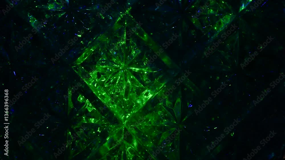 Intro for a rhythmic music video. Green and red lights through a crystal pattern.