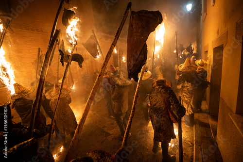 young people holding torches during the celebration of el vitor, in the town of mayorga, Valladolid on september 27 as every year.
