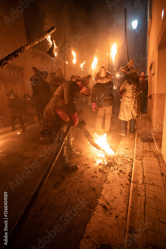 young people holding torches during the celebration of el vitor, in the town of mayorga, Valladolid on september 27 as every year.