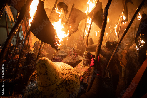 young people holding torches during the celebration of el vitor, in the town of mayorga, Valladolid on september 27 as every year.