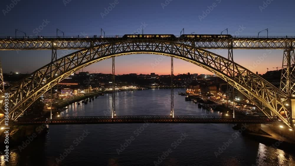Sunset Luis I Bridge At Porto In Porto District Portugal. Sunset City Scene. Illuminated Bridge Landscape. Luis I Bridge At Porto District Portugal. Beautiful Dusk Skyline. Sunset Luis I Bridge At Porto In Porto District Portugal. Sunset City Scene. Illuminated Bridge Landscape. Luis I Bridge At Porto District Portugal. Beautiful Dusk Skyline.