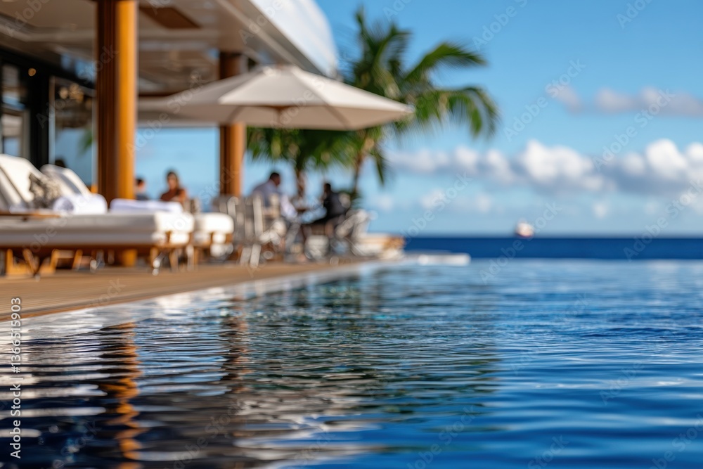 A serene view of a luxurious poolside area, showcasing relaxing loungers and an inviting pool against a stunning backdrop, encapsulating leisure and tranquility perfect for holidays. A serene view of a luxurious poolside area, showcasing relaxing loungers and an inviting pool against a stunning backdrop, encapsulating leisure and tranquility perfect for holidays.
