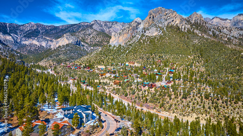 Aerial of Snow-Capped Mt Charleston Village with Evergreen Forests
