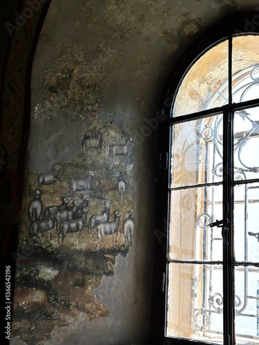 old window in a brick wall