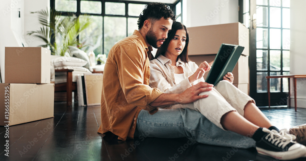 Tablet, cardboard and couple in new home with planning for renovation. development or moving. Boxes, real estate and man with woman on digital technology for online order with maintenance in house. Tablet, cardboard and couple in new home with planning for renovation. development or moving. Boxes, real estate and man with woman on digital technology for online order with maintenance in house.