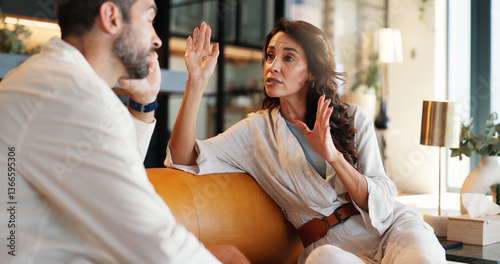 Couple, talk and arguing with fight at house for disagreement, conflict and divorce discussion. Woman, explain and bored man for conversation, toxic relationship and drama and marriage fail in lounge
