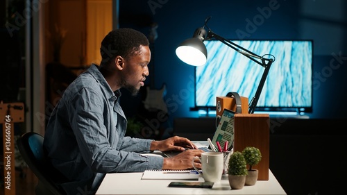 African american consultant examining constitutional balance records and expenditure figures for regular accounting evaluation. Financial analyst reviews corporate budgetary constraints. Camera B.