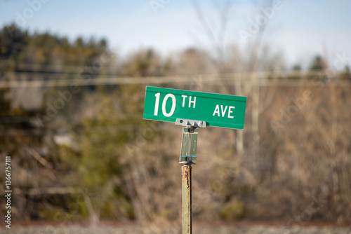 Fototapeta Naklejka Na Ścianę i Meble -  A road sign in the small town
