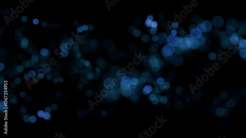 abstract blue light bokeh on black background