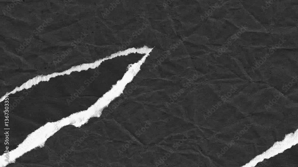Piece of black crumpled paper with torn edges, suitable for design backgrounds, artistic projects, crafts, or adding texture to compositions.