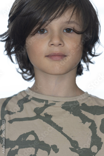portrait of a young Irish boy with long hair 