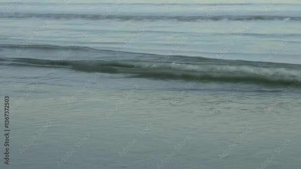 Calm Ocean Surface Rippling Quietly With Tranquil Colors In Gentle Breeze Calm Ocean Surface Rippling Quietly With Tranquil Colors In Gentle Breeze