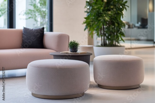Chic ottoman set for office lounge, upholstered in soft fabric.