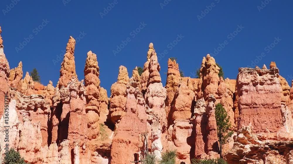 Explore stunning red rock formations at Bryce Canyon National Park during a vibrant afternoon in nature Explore stunning red rock formations at Bryce Canyon National Park during a vibrant afternoon in nature