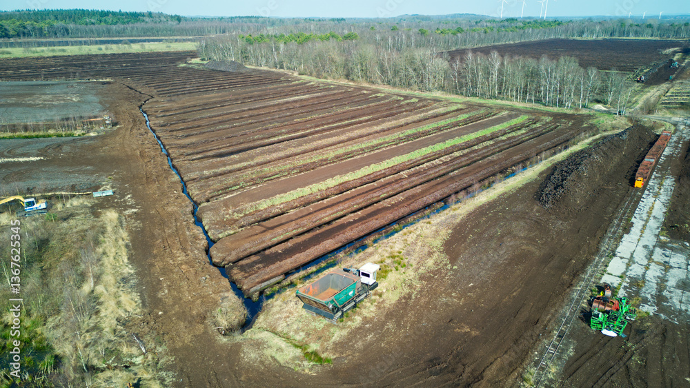 Naklejka premium Lower Saxony, Germany - March 23, 2025: Drone footage of a peat mining area in Lower Saxony 