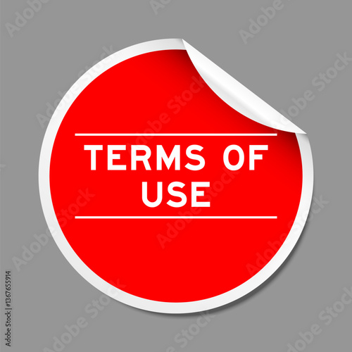 Red color peel sticker label with word terms of use on gray background
