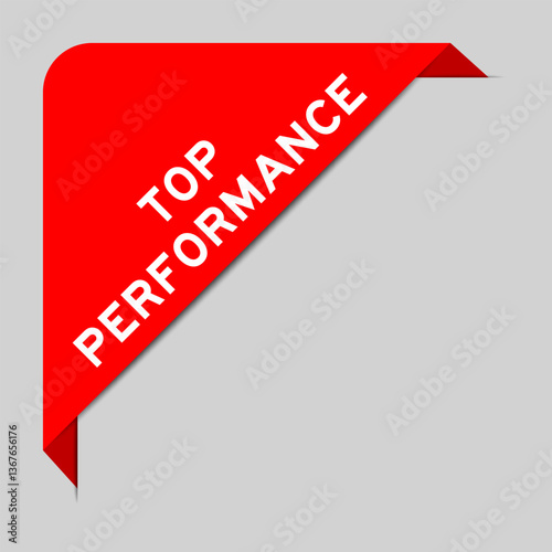 Red color of corner label banner with word top performance on gray background