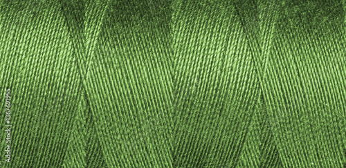 Obraz na płótnie Green sewing thread texture w salonie