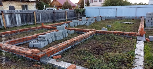 a plot of land on which construction of a foundation has begun