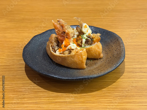 Obraz na płótnie asian japanese sushi mentai cheese soft shel crab bean curd tofu skin rice wrap in plate on wood table asian dim sum halal food restaurant cuisine banquet menu for cafe w salonie