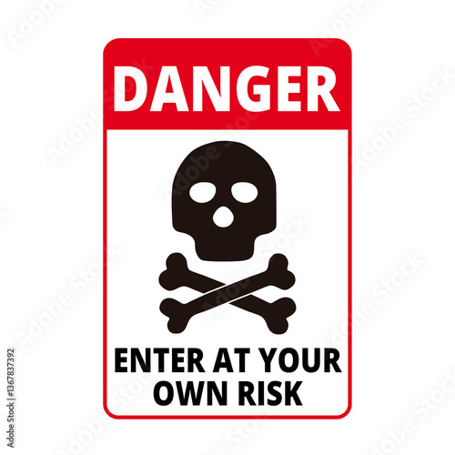 Fotografie Danger enter at your own risk sign with a skull and crossed bones