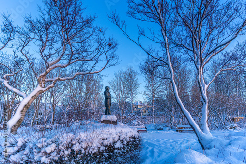 View of the Jonas Hallgrimsson statue, 1807-1845, in the city centre of Reykjavik at sunset in winter, Reykjavik