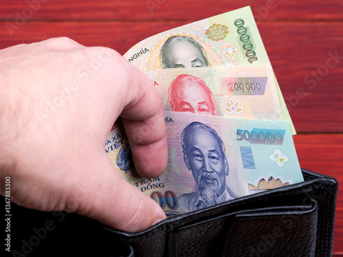 Vietnamese dong in the black wallet