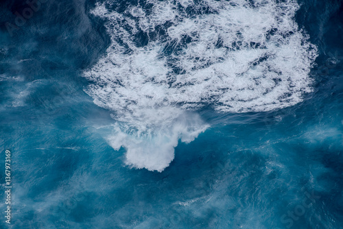 Huge crushing waves seen from above creating amazing textures. 