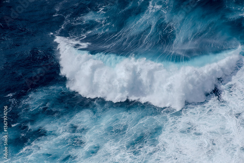 Fototapeta Naklejka Na Ścianę i Meble -  Huge crushing waves seen from above creating amazing textures. 