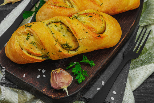 Fresh baked garlic bread, gluten free buns. Tasty food, fresh parsley, fragrant spices
