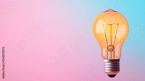 A single glowing light bulb against a vibrant gradient background representing the power of new ideas